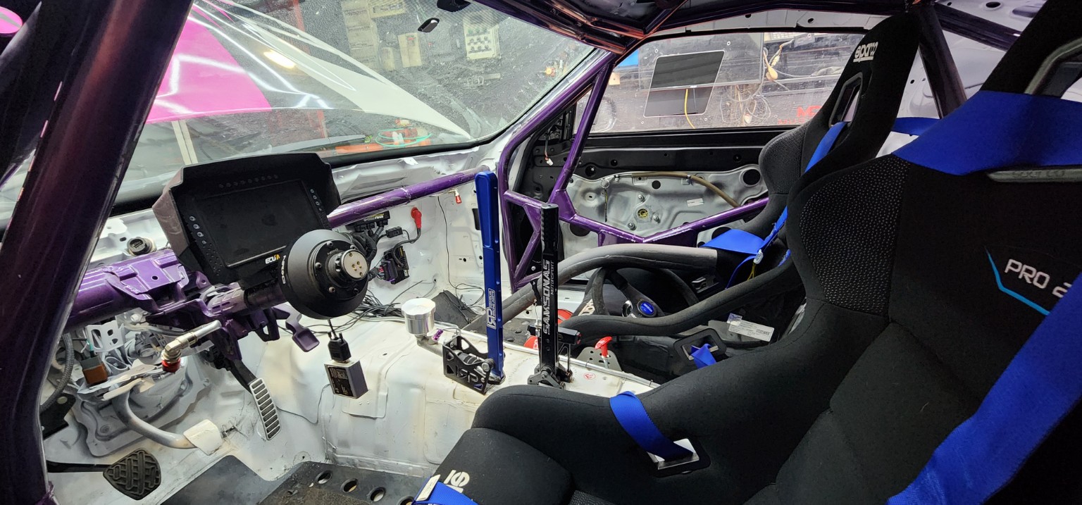 Competition car cockpit with custom electronics
